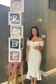 I loved this dress! It fit perfectly and was really comfortable! The fabric was stretchy but thick and of good quality. I got so many compliments on it. I loved it so much that I bought it in black too! - Alyssa A.