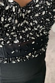 Sorry, I don't have a full body picture of the dress, but I still wanted to review it since there were no reviews when I purchased it. It's a very subtle glam old Hollywood dress. The material is heavier than I thought, but it's good since it hid my tummy well without shapewear. It was true to size and flattering. My main concern was that I didn't want the beading to come off. Also, it was not quite for the event I was preparing for. I still would recommend the dress. - Naya J.