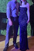 This dress was so comfy and beautiful; it was perfect for my college ring dance. I am 5'5 and I did need to get the length altered since it was a little too long. Otherwise, it fits perfectly. The sparkles are gorgeous, but beware, it does shed glitter quite a bit. Overall, a really nice dress! - Natalie S.