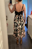 I am always between a small and medium and I went with a medium in this and definitely should've gotten a small. The straps are adjustable but they are silky so they slip out of adjustment easily. I am 5'5" and 130 and small chest, and the medium was big in the chest and waist. I loved the texture the flowers gave the dress but the big ones looked droopy like they were maybe falling off. - Cara A.