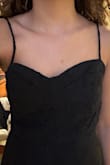 I was super excited for this dress! However, the bust is loose and undefined, unlike on the model it is tight fitting. The straps came tied in 2 different lengths. Also the waist area runs bigger than expected. I would suggest sizing down especially if you have small shoulders and chest and are looking for a defined waist as pictured on the model. The dress was also longer than expected! - Aida T.