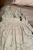 Dress is too big, I bought it for a wedding in May will continue to shop around. Otherwise it's a beautiful dress. - Rita P.
