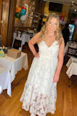 Loved this dress! The ties on the back are a bit complicated to figure out at first, but once you get the hang of it, it's easy. Wore this for my bridal shower and got so many compliments on it!! - DeAnna D.