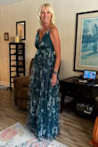 This dress for me so perfectly! I was shocked as I am 6' tall (long legged). I have small boobs so I purchased Boomba to wear as an uplift and breast enhancement. This dress is beautiful, and it looks and fits exactly as in the picture. Look at their size chart. I believe it is true to size. I won't be able to wear heels, but I usually don't so this dress is long enough. So, so happy with it. - Dinah W.