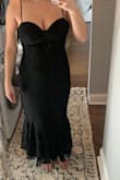 This dress is very flattering and a good fit for someone who is shorter (5'1), but it did run small. Obviously, it went longer down than the model but not too long that I'd need to get it hemmed. I read the reviews to try to get an idea of my size but ended up needing a large. The chest section fit me fine, but the back could not get close to zipping up - Jenna T.