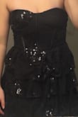 It's a pretty dress, but it felt not only cheap but uncomfortable as well. Although I know there are sequins, they tend to fold over a little on the side that touches my chest. This makes it spiky and itchy in that small area, but it is doable. The main problem I had was that it came in wrong. There were no sequins whatsoever on one side of the chest, and that made it appear very asymmetrical. Customer service helped me out with a refund, but it still was annoying to have to deal with. - Alana F.
