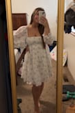 It was so cute and fit perfectly. I have big boobs so I was nervous on what size I should choose. Size said could be large, but I'm normally a small or medium. I ordered a medium. So happy with it. Can't wait to wear it to my garden party bridal shower! - Sarah A.