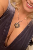 The only change I had to make was to have the dress hemmed. Beware that this is very low cut so if you are larger busted, the girls are definitely on display! - Kirsten O.