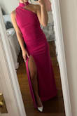 I originally ordered this dress in a S but I exchanged it for an XS. The cut is unique and the material is good quality. - Emma V.
