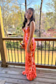 I loved this dress so much. I got SO many compliments on this dress and the trail on the back of this dress was so pretty. The cups on the dress were perfect and the back of the dress was so cute I love the tie and how you could make it how tight or loose you wanted. The dress was also so flattering but not too showy!! Def recommend best dress ever!!!!! - Charlotte S.