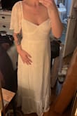 I was nervous about the sizing but it worked out perfectly and fit so well! The tie up back allows you to give a little room where you need it and also feels so secure. - Katelyn G.