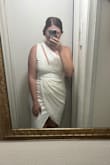 The material is nice and I love the style and fit of the dress. I got it in white so it is a little see through but if you go with a color I don't think you would have that issue at all. The front has the perfect design. - Emily C.