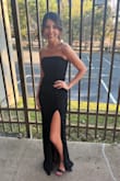 Snug fit. Slit on the side is pretty high but the gown is gorgeous, and fit just right for a short girl like me. Wore heels w/ my dress to make the maxi dress work. The 3D flower detail is tasteful and not cheap looking. Highly recommend. - Felicia B.