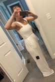 I was so hopeful about this one. Always on the lookout for a good jumpsuit and I have a hard time finding them that fit.
It ALMOST hit the mark. Beautiful fabric. Really well made. Top fit great too. You can wear a bra easily if needed with the straps but it's snug enough smaller busted ladies could very easily go braless.
Issue is the bottom. WAY WAY WAY too much fabric! It's double layered - which is nice cause it's not see through and it still light enough for summer - but it poofs out so much I feel like it adds 20 lbs. The fabric is actually thick enough it would probably be fine with just 1 later. Or 2 layers with thinner fabric.
Either way, just didn't work for me. Returning for something else on my list. - Kasi H.