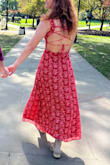 I wore this dress when I got engaged. I felt so comfortable, and it looked great in pictures! I love the lace-up back because you can really adjust the fit, and the neckline is high enough that you still feel secure. The arm straps felt a little tight but not uncomfortable. - Megan Z.