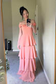 Purchased to wear as a bridesmaid for one of my good friend's wedding. The top and torso fit fine; it's just really long. I will have to hem almost the entire bottom ruffle (worn with heels) to fit me properly. I expected this, just an FYI for people who are around my height. - Juliet K.