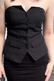 I'm really glad I made this purchase; I wear it out all the time! My only issue is that it keeps falling down. I'm a 32B, and I have to wear a bra underneath & tuck in the straps for it to stay up. It's definitely meant for women with a slightly bigger chest, but it fits perfectly everywhere else!! :) - Elise M.