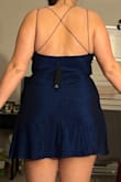 I absolutely love this dress. The material, the color, and the fit are perfect. Except I'm pretty tall and even the XL is quite literally 1/2 inch from my butt. If I were dancing, I'd be flashing everyone. Would love to have one just a few inches longer. Sadly can't return it, as it was final sale - Shelby B.