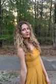 Loved this dress! The color was stunning, the fabric was soft and flowy -definitely high quality! I had to use an adhesive bra for the top because it is backless. And the slit in the dress runs all the way up to the waist. Luckily, I know how to sew a little and I was able to make it to where it wouldn't open where I didn't want it to with a few quick stitches! - Suzannah S.