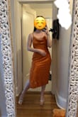 I'm attending a wedding in the desert and wanted something that would be comfortable in the heat and blend in with the landscape. So I got this dress in the rust orange color, and it's perfect for just that! Unlike many slip dresses, this is lined and feels like quality satin. It does need to be steamed, particularly the cowl neck which does lay funny, but it will look much smoother once it is. I love the low back, the open slit on the left side, and the rose pattern detail. I got a size small, and it fits exactly how I'd want it to. - Katherine Y.