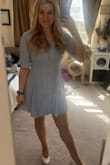 The dress is long enough that I feel comfortable wearing it at work. It's a little tight across my shoulders and chest, but I am broad in that area. So many compliments! - Sarah R.
