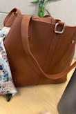 It is the most stylish bag. Good space, I can fit my work laptop easily. There is one more compartment that I loved - Komal S.