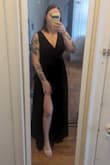 I originally ordered the dress in a size Large based on other reviews; it was too small and wouldn't zip. I got the XL (my normal size), and overall, it was okay, slightly loose in the sides but not noticeable. I did have to get the straps altered; they were about 1.5 inches too long, and my boobs would have fallen out. Also, it was slightly long on me, even with 2 inch heels. I'm 5'7" so if you're short, you will need to get it altered as well. The quality feels good; it's heavy but not too heavy. - Leah M.