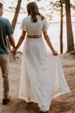I wore this as one of my outfits for my engagement photoshoot, and it was perfect! I got so many compliments on the dress, and it was fun to have something to play with that our photographer brilliantly utilized for different poses. As with most white outfits, be careful what you wear underneath. I'd recommend it for any bridal event! - Allie S.