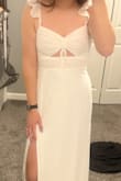 Ordered this for my bridal shower! Wasn't sure about it when I ordered it but figured I'd give it a shot & I love it! It's super cute on. I'm 5'7 and it hits right at the floor perfectly so just keep that in mind. I don't plan to wear heels so it works great! I'm usually a 6/8 in jeans & ordered a medium. It's slightly snug around my ribs but nothing that is uncomfortable or worth returning over. Super happy with this dress! - Kaitlyn H.