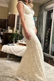 The dress was wonderfully made and shipped fast. The lace works with great quality.  Had to do minor tailoring for a perfect fit. Highly recommend. Needed a last-minute wedding dress and this was perfect. - Marianna L.