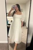Stunning dress that fits great! I will be using it for my bridal shower. Glad I chose a size large; I could have sized down to a medium, but the chest would not have had enough coverage. Also, not see through at all! Perfect white dress for any occasion. I'll also use it on my honeymoon. - Shanya A.