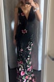 I'm obsessed with it! My only issue was that the sleeves in the back were a little long but I'm getting it altered! It fits perfectly otherwise. - Abigail T.