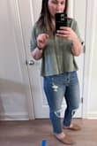 Love this top. It camo's my tummy, which I'm not in love with. It's comfortable and classy. Just the right length. Pics show the side view too, a little longer in the back - Aubrey Y.