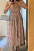 I love this dress and can't wait to wear it!  I got a medium, and it fits me like a glove. Great for larger busts as well. - Madeleine S.