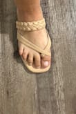 I wouldn't  say my feet are "wide" by any means (I've never had to get "wide" EVER before) but I guess these are meant for petite, skinny feet lol. Beautiful sandal, though, otherwise. Seems like good quality. - Maribel B.
