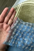 Runs super long, I'm 5'2 and with 3-4" heels it still dragged on the ground. The ends are not finished so it looks super frayed and bad quality. The blue is not like the cute light pastel blue from the golden hour picture, more of a bright powder blue. Not good quality either, the zipper is hard to pull up even when not on because of the mesh fabric. - Sara L.