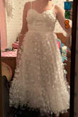 I absolutely adored the butterfly details even though I was a bit skeptical about them when I ordered, but they're so well-made and pictures don't do justice to how lovely they are in person. I didn't end up keeping the dress cause I thought it hit me at a weird point on my waist, and it wasn't flattering enough. But the back and straps are adjustable and if you have the right body type for this dress, it's stunning! - Elaine S.