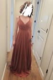 It's a beautiful dress. Runs a little small and long, but will be a beautiful bridesmaid's dress for my daughter at my wedding. - Danielle F.