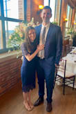 I'm petite so it's hard to find dresses that fit right. This dress was perfect! I wore it to a cocktail wedding and it was very classy. I didn't want to show skin, so I threw on a navy tank top that I've  had in my closet for forever under the dress, and you could not tell at all. It blended seamlessly. The navy dress matched my husbands navy suit perfectly. It was hard to tell on the computer what shade exactly it would be- some pictures of the dress looked like a brighter navy blue, but in person, it was not too bright of a blue. It is beautiful. It's elegant and modest, while still being fun and stylish. I love this dress and can't wait to wear it again. I have no complaints. - Stephanie S.