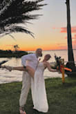 I was utterly enamored with wearing this dress on my wedding day. As Florida natives, my husband and I opted for a picturesque ceremony aboard an airboat at sunset. The dress seamlessly combined comfort with allure and sophistication. It garnered numerous compliments, and I'm thrilled with my decision. Though minor alterations were needed to lift the straps and adjust the length, the overall fit was impeccable. This stunning gown celebrates beauty and elegance, flattering diverse body types with ease. - Julia V.