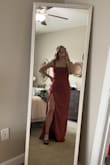 The dress is nice, but the color is a little darker in person. It was a little big in the chest, and beware- the slit goes all the way up to your waist! You could easily and accidentally expose yourself!! - Camille F.