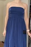 The color of this dress is GORGEOUS and the material is very nice/great quality. I have a rectangular body shape with little waist/hip definition. This did absolutely nothing for me, and I felt that the bottom made me look a lot bigger than I wanted. I think I need a more fitted bodice, and the bubble skirt didn't work for me. I couldn't get the top to stay up even with the andi-slip lining. Looked a lot better with a bra, but then the strap was showing. I'd have to take this to a tailor to get cups sewn in, which at this point I'm not going to bother. I'm sure this would look amazing on someone else though, it really is great quality! - Sarah C.