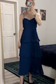 I love the color of this! It is a little big in the chest and bodice, but not enough for to worry about it. It's well made and just so fun. - Tori K.