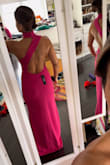 This was a fun dress! Everyone loved it, especially me! It was different and in a great color. It was a tad long so I got it hemmed! The back is amazing! - Manelly C.