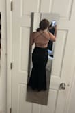 I absolutely love this dress! It fits a little tight in the legs but I think that's just how the style is. I love how it makes my body look and the open back is gorgeous! - Riley K.