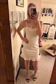 This dress is super flattering and I love the texture! Wonderful quality and it is lined!! The ruffle is super cute and it definitely hugs your curves if you've got them. I am smaller chested so it was a tad baggy up top but I can manage. It wasn't as bad as other dresses in the past. I'm also almost six foot and it is the perfect length. Can't wait to wear to graduation :) - Abbey H.