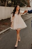 Purchased this for my engagement shoot and it was just was I had envisioned. Just the right length and the top was stretchy. Ordered my normal size and it fit great. It didn't look too big either with the fullness of the skirt. - Sierra H.