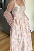 Very Beautiful, material is soft. It's a pretty vintage look. Comfortable. The top fit a little loose and a little low for my liking but still liked it. It's cold where I live, and I think the dress would work better in the summertime! - Rebecca M.