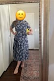 Fits perfectly and very flattering. I'm not very tall and I have a full bust and I like that this dress has good coverage without being frumpy. - Lisa S.