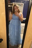 This dress is absolutely gorgeous, I love the tulle material and the bodice is very flattering. I will probably trim off the bottom tier of tulle and hem the inside dress lining so that it doesn't drag so much on the floor when I walk. Though, this problem could easily be solved by wearing taller heels, or if you are already a naturally tall person. Nothing seems wrong with the dress other than my person preferences though; the material is quality and no obvious rips or tears, the zipper works nicely, and my only concern is the thinness of the straps, but I don't foresee them causing any wardrobe malfunctions :) - Cecelia H.